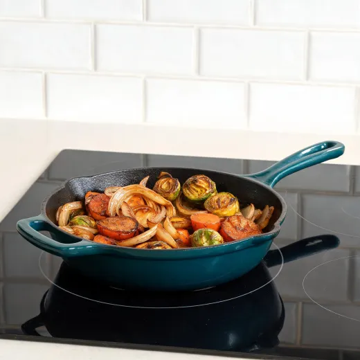 Cast iron skillet with enamel exterior